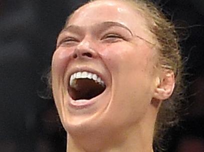 Ronda Rousey, celebrates after defeating Cat Zingano in a UFC 184 mixed martial arts bantamweight title bout, Saturday, Feb. 28, 2015, in Los Angeles. Rousey won after Zingano tapped out 14 seconds into the first round. (AP Photo/Mark J. Terrill)