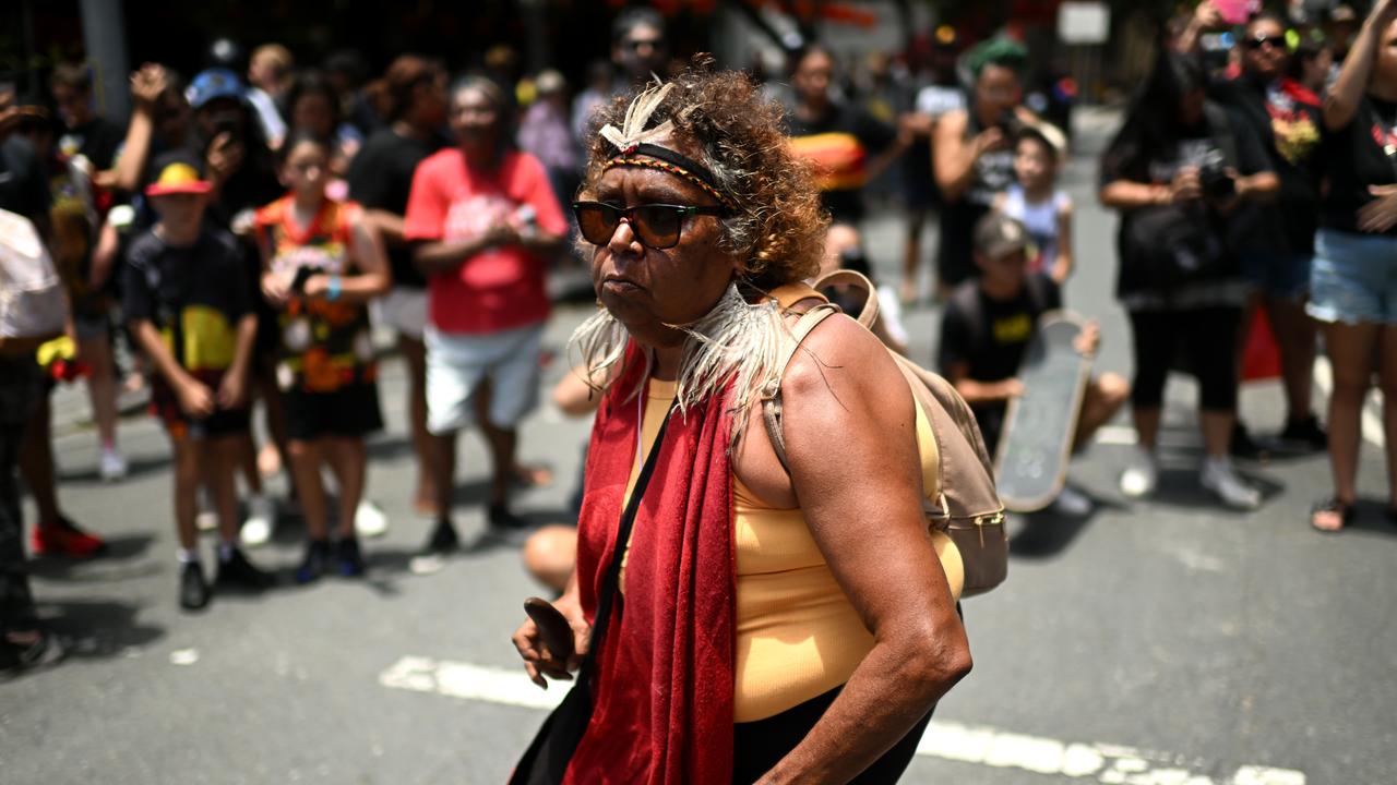 Protesters take part in an Invasion Day rally and march in Brisbane, coinciding with Australia Day. Picture: NCA Newswire / Dan Peled