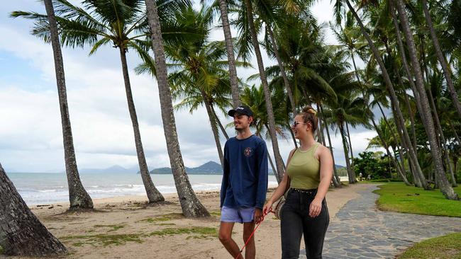 Brayden Javis and Jessica Smith walk along the Palm Cove foreshore, which will lead into the 94km Wangetti Trail. Picture: Nuno Avendano