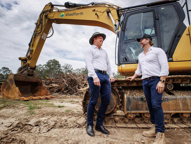 Deputy Premier Steven Miles and Kent Leicester, Managing Director of KDL Property group at a housing development site at Joyner on Sunday morning. Picture Lachie Millard