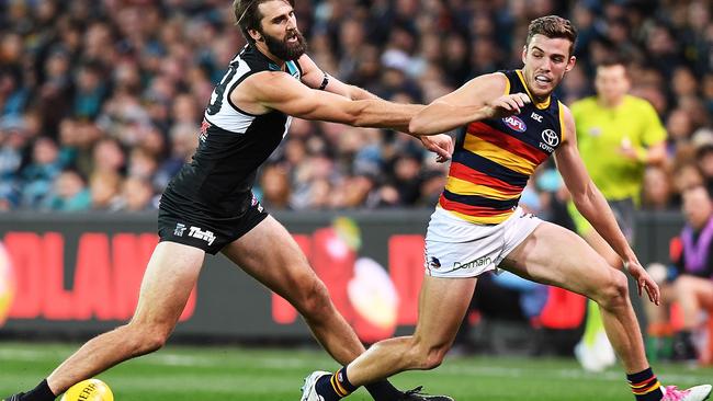 Justin Westhoff pushes Paul Seedsman off his line in the Showdown. Picture: Mark Brake/Getty Images