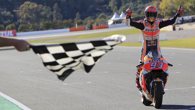 Marc Marquez crosses the line to clinch the 2017 MotoGP world championship.
