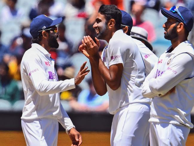 Ashwin and Jadeja celebrate a wicket during India’s 2020-21 tour of Australia.