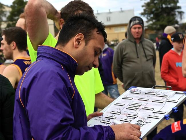 Vermont coach Harmit Singh moves the magnets. Picture: Davis Harrigan