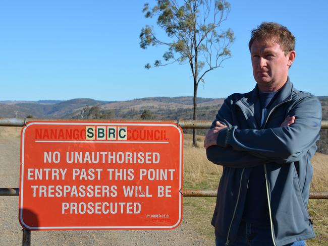 Nanango's Paul Wirth outside the locked gate blocking public access to McCauley Weir. Photo: Jordan Philp / South Burnett Times.