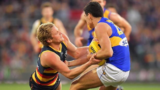 Crows vice-captain Rory Sloane, left, could be the hottest free-agent on the AFL market today after so many other prime candidates have chosen to sign new deals with their current clubs. Picture: Daniel Kalisz (Getty Images)