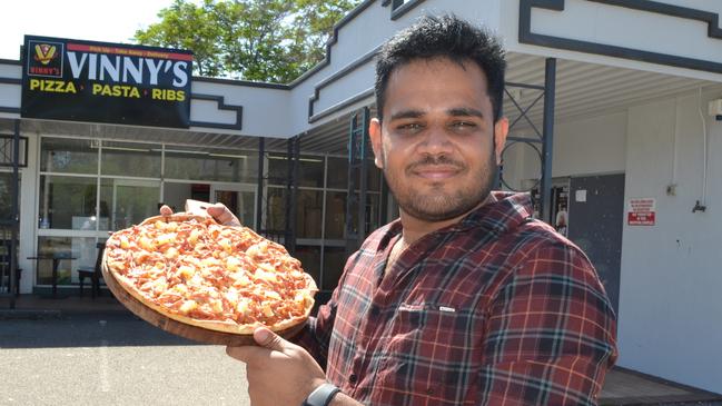 Prinsal "Prince" Patel outside Vinny's Pizza Pasta Ribs restaurant at Edison Plaza, Wulguru.