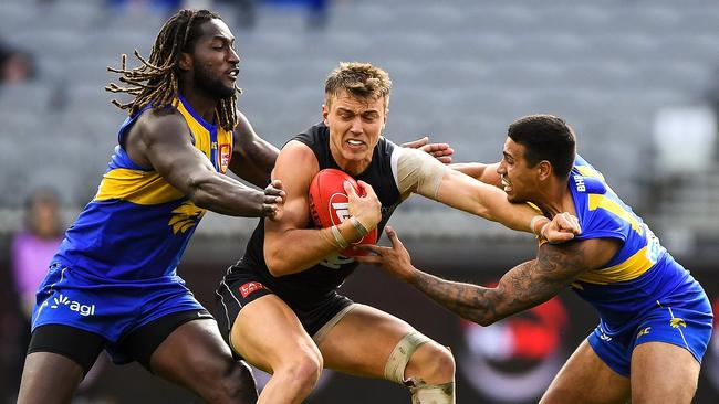 West Coast’s top paid stars like Nic Naitanui (left) and Tim Kelly (right) will take a pay cut to help out with salary cap squeezes. But it may cost the club Patrick Cripps (centre).