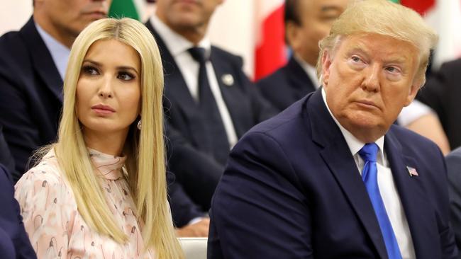 Ivanka Trump sits next to her father Donald Trump. Picture: Dominque Jacovides/AFP