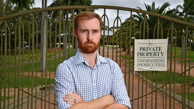 Councillor Joe Wilkinson outside the gates to the Arundel Hills Country Club. Picture, John Gass