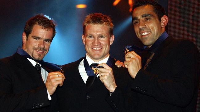 Mark Ricciuto, Nathan Buckley and Adam Goodes with their Brownlow Medals in 2003 after the second three-way tie in Brownlow history. Picture: Julian Smith