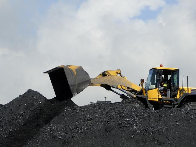 digger moves coal