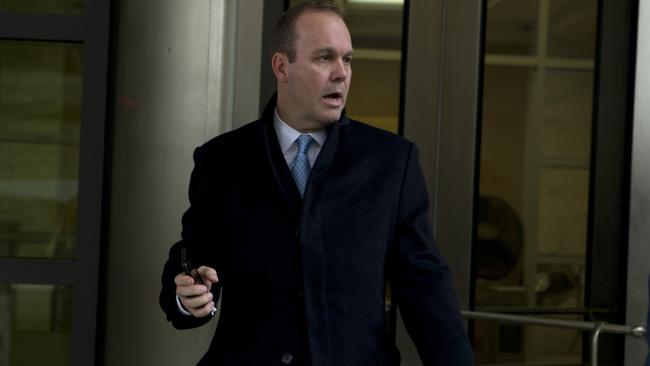 ‘I accept complete responsibility for my actions’: Rick Gates leaves the federal court in Washington on Wednesday. Picture: AP.