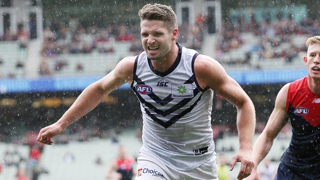 AFL Round 14. 22/06/2019.  Melbourne v Fremantle at the MCG.  Jesse Hogan of the Dockers grimaces in pain as he lands on his injured right foot 1st quarter     .  Pic: Michael Klein