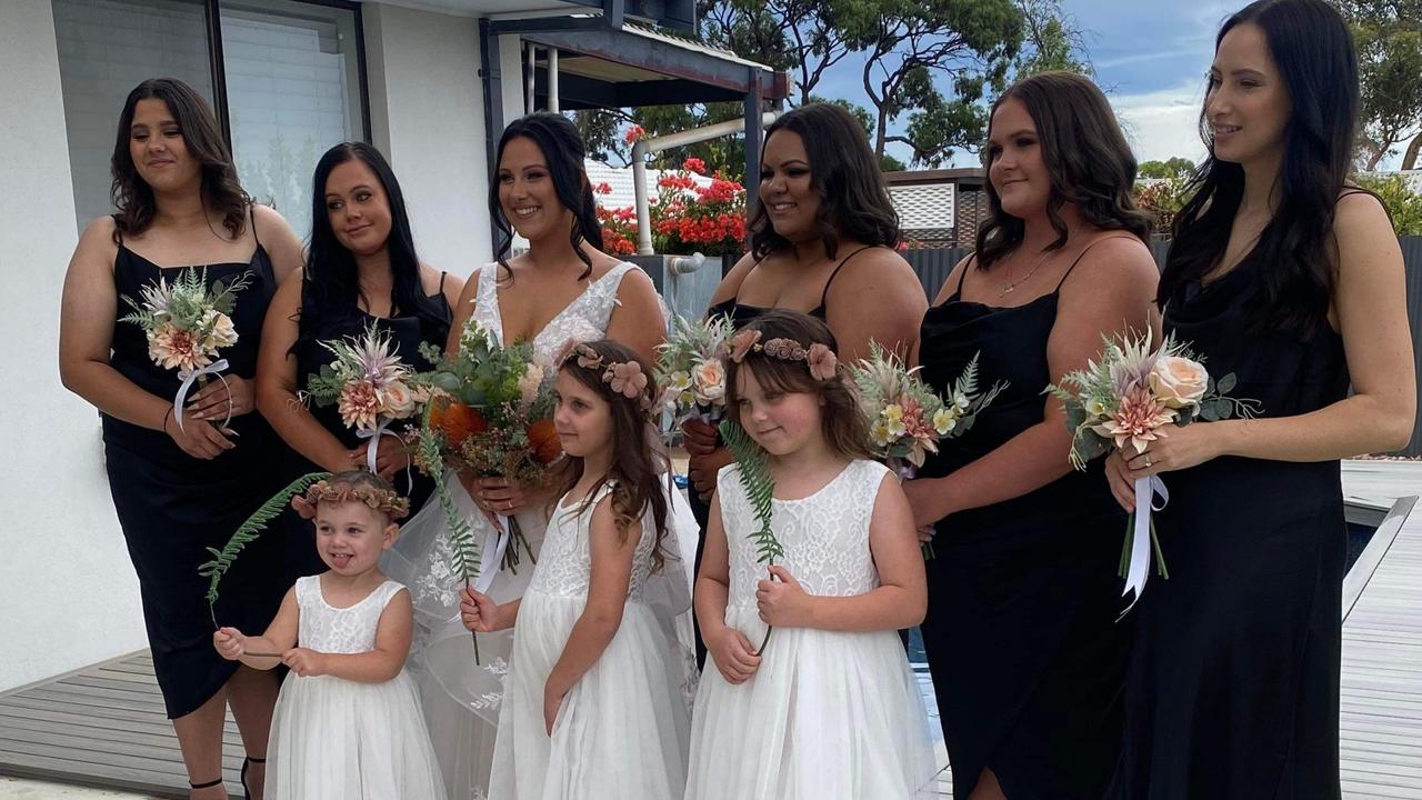 The bride spend $400 on her dress while the bridesmaids dresses each cost less than $20. Picture: Colleen Strangways and Reece McArdle