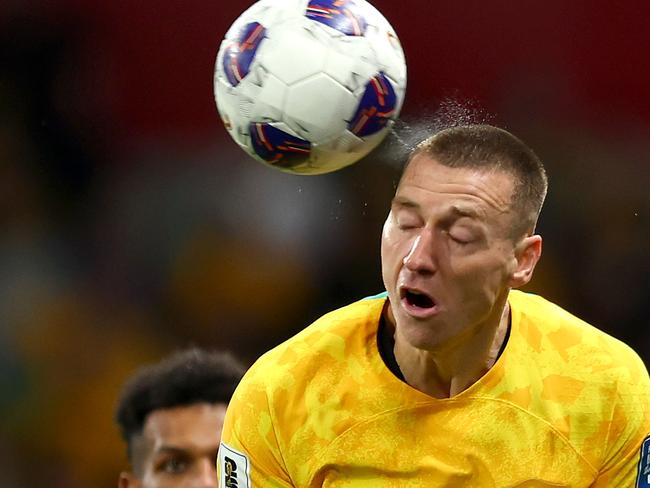 MELBOURNE, AUSTRALIA - NOVEMBER 14: Mitchell Duke of the Socceroos heads the ball during the Round 3 2026 FIFA World Cup AFC Asian Qualifier match between Australia Socceroos and Saudi Arabia at AAMI Park on November 14, 2024 in Melbourne, Australia. (Photo by Graham Denholm/Getty Images)