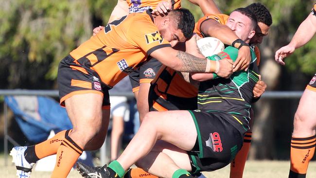 Brayden Young is tackled. Picture: Richard Gosling