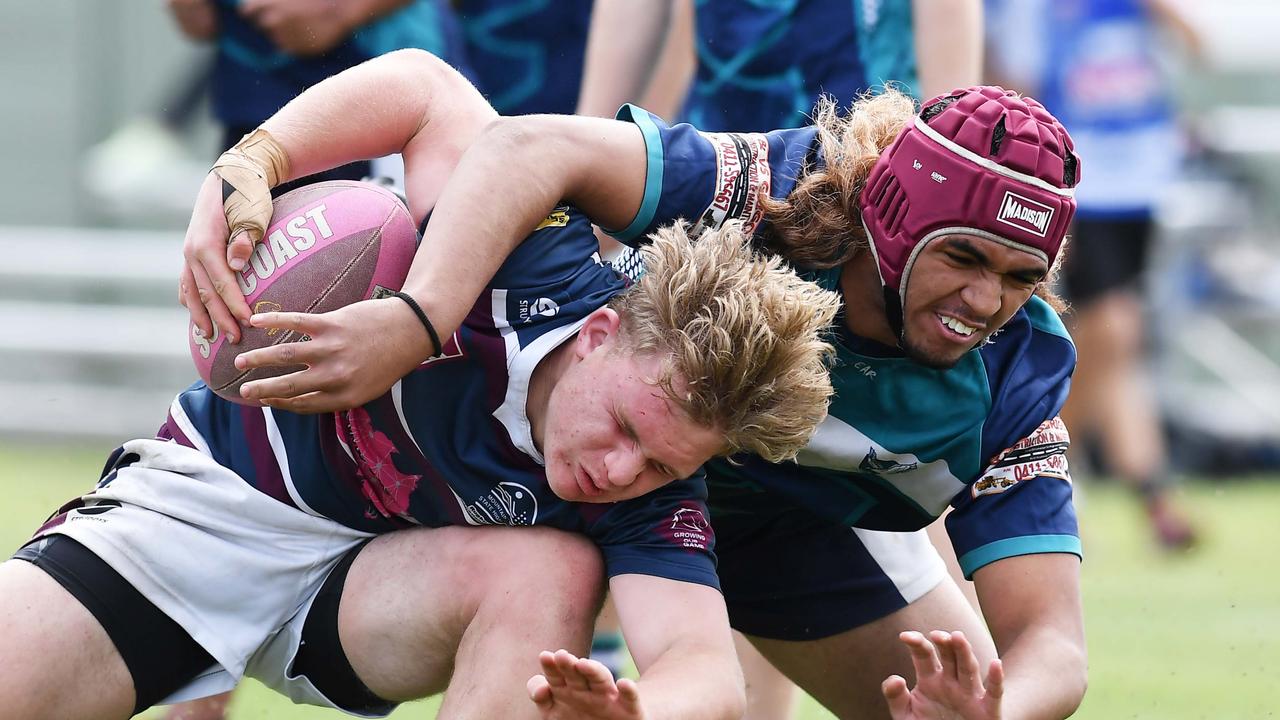 RUGBY LEAGUE: Justin Hodges and Chris Flannery 9s Gala Day. Mountain Creek State High (white shorts) V Morayfield State High, year 10. Creek's Kaydin Waghorn on the burst. Picture: Patrick Woods.