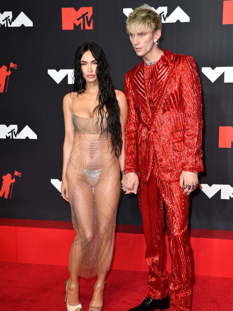 … and with MGK at the 2021 VMAs. Picture: AFP