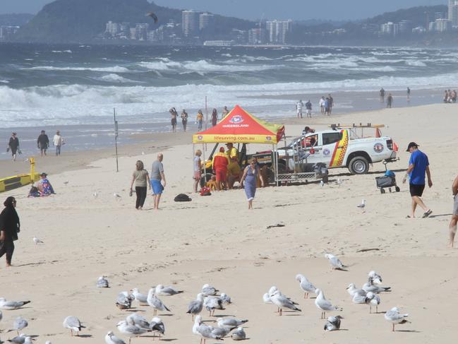 People out and about over the Gold Coast  being CoVid safe on the Easter holidays.Small crowds on the beach at Surfers Paradise..  Picture Glenn Hampson