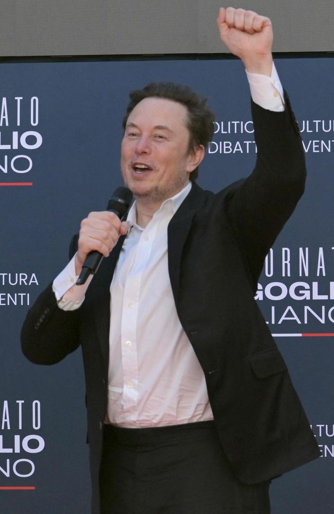 X CEO Elon Musk raises a fist during the Atreju political meeting organised by the young militants of Italian right wing party Brothers of Italy (Fratelli d'Italia) on December 16, 2023. Picture: Andreas SOLARO / AFP