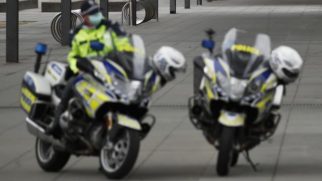 A police officer has been seriously injured after coming off his motorbike. Picture: NCA NewsWire / Daniel Pockett