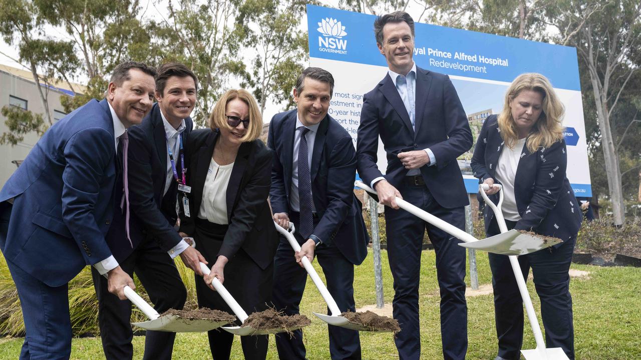 Health Minister Ryan Park, fourth from left, next to NSW Premier Chris Minns, at a major construction milestone for the $940m Royal Prince Alfred Hospital redevelopment. Picture: Monique Harmer