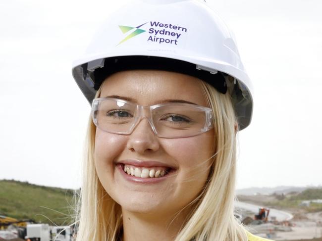 ON HOLD. Embargoed for he Daily Telegraph Future West Campaign.   Do not use with speaking to DT pic desk.   DAILY TELEGRAPH 4TH MARCH 2024Pictured at the site of the new Western Sydney International Airport at Badgerys Creek is Mikayla Beecroft.Mikayla is Community Engagement Officer of airport construction. Behind Mikayla we see the view north east looking towards where connecting roads and the airport metro are being built.Picture: Richard Dobson