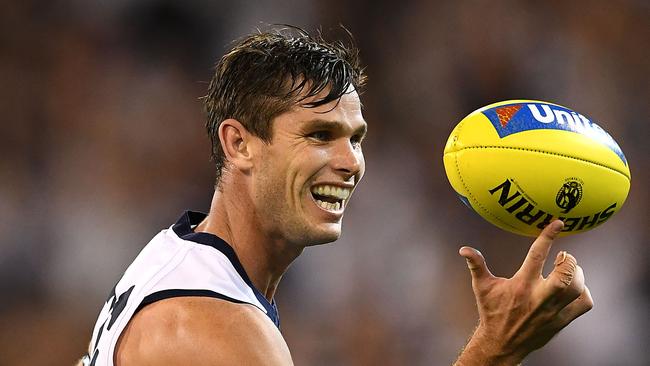 MELBOURNE, AUSTRALIA - MARCH 22: Tom Hawkins of the Cats celebrates winning the round one AFL match between the Collingwood Magpies and the Geelong Cats at Melbourne Cricket Ground on March 22, 2019 in Melbourne, Australia. (Photo by Quinn Rooney/Getty Images)