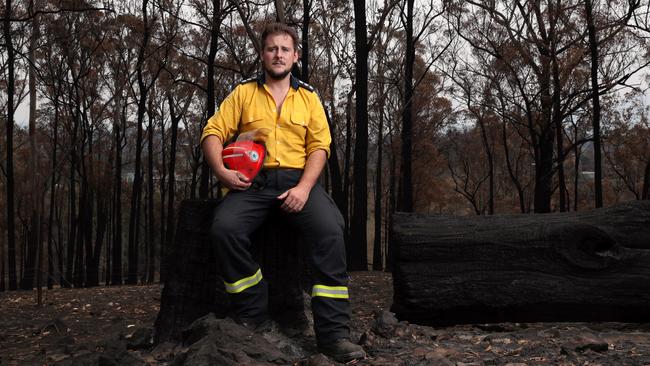 RFS firefighter Nathan Barnden at Mr Pauling’s parents’ Quaama home. Picture: Jonathan Ng