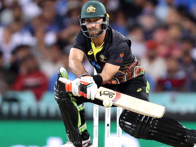 Australia's batsman Glenn Maxwell plays a shot during the third T20 cricket match between Australia and India at the Sydney Cricket Ground in Sydney on December 8, 2020. (Photo by DAVID GRAY / AFP) / --IMAGE RESTRICTED TO EDITORIAL USE - STRICTLY NO COMMERCIAL USE--