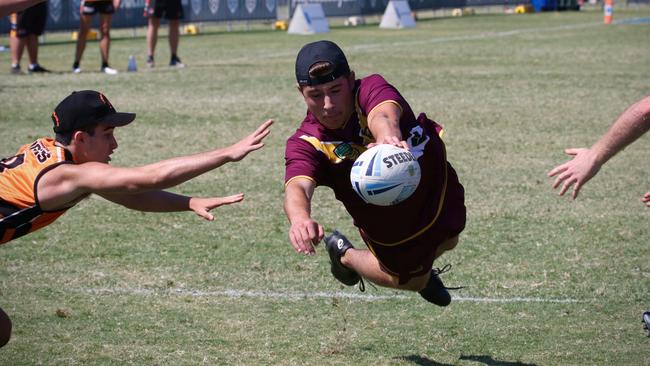 Tommy Watson dives for the line for the Hills Hornets under-18 boys during the southern conference finals of the Junior State Cup. Pictures: Kathryn Johnston Photography