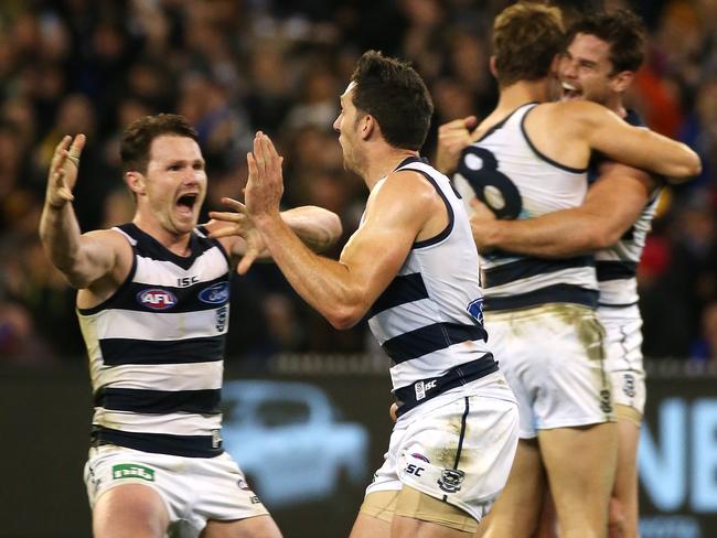 Patrick Dangerfield celebrates with Harry Taylor. Picture: George Salpigtidis