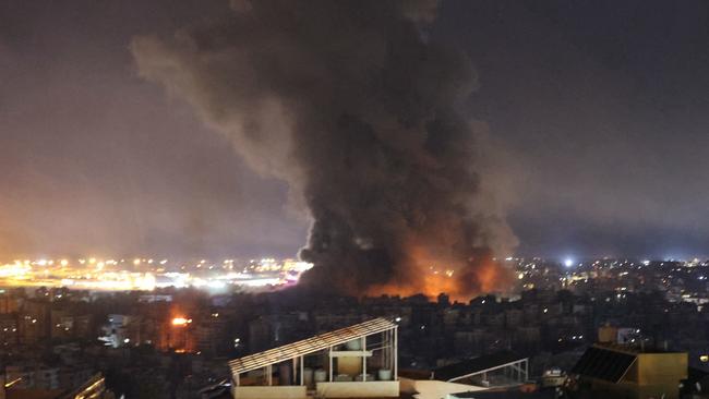 Smoke rises after an Israeli airstrike targeting an area in Beirut’s southern suburbs.