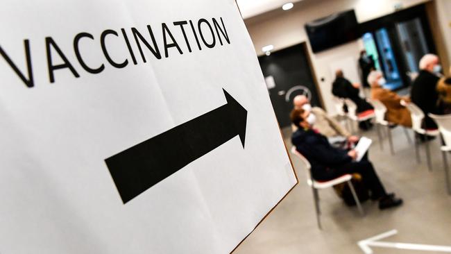 People wait to be vaccinated for COVID-19 at a vaccination centre in Quimper, western France. Picture: Fred Tanneau/AFP