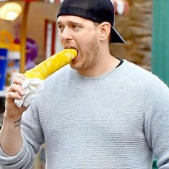 Michael Buble was snapped eating a corn on the cob incorrectly, which inspired a fan's "phallic" tattoo. Picture: Channel 10 / The Project