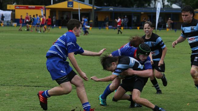Day 1 of the King of the Country junior rugby union tournament at the Gold Coast Eagles Rugby Union Club.Maroochydore Swans (BLUE AND BLACK) vs USQ Saints (Blue ) Maroochydore Player No USQ Player No Pic Mike Batterham