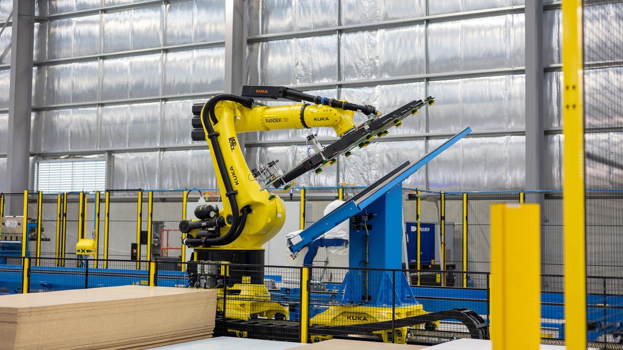 A robot working on prefabricated home builds at Melbourne’s Modscape factory. Image: supplied.