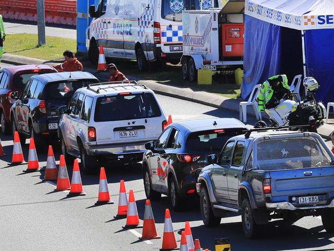 Queensland Police stop and inspect all vehilces attempting to enter Queensland at Tugun outside the Gold Coast Airport  border crossing.Photo Scott Powick Newscorp