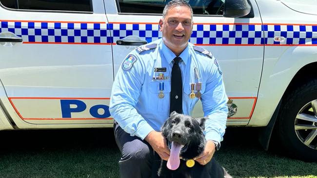 Police Dog (PD) Bravo from the Gold Coast District with his handler, Senior Constable Joseph Alofipo.