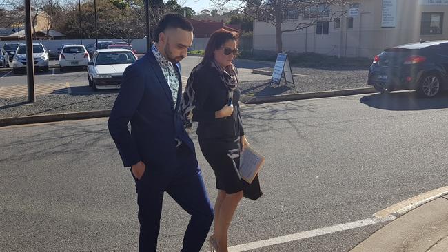 Clarence Yates outside the Christies Beach Magistrates Court with his lawyer, Stacey Carter. Picture: Sean Fewster.