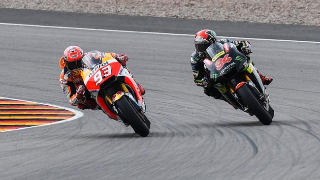 Marc Marquez fends off Jonas Folger to win the German MotoGP.