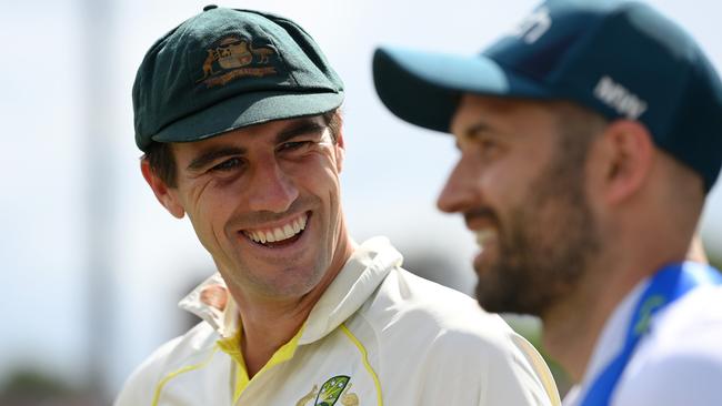 Pat Cummins chats with Mark Wood following the Third Ashes test in Leeds. No one needs a short break more than the Aussie skipper but would others benefit from a tour match. Picture: Stu Forster/Getty Images