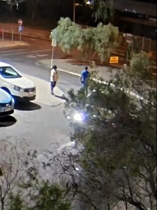 A still from CCTV footage of the incident, in which a man and a woman can be seen in the area in front of the Alice Springs Hospital emergency department entrance on Thursda,y January 7 night.