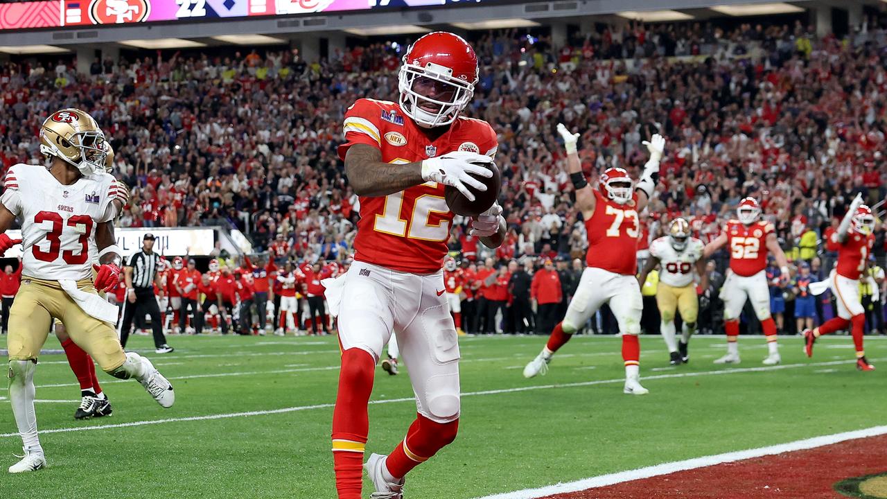 LAS VEGAS, NEVADA - FEBRUARY 11: Mecole Hardman Jr. #12 of the Kansas City Chiefs celebrates after catching the game-winning touchdown in overtime to defeat the San Francisco 49ers 25-22 during Super Bowl LVIII at Allegiant Stadium on February 11, 2024 in Las Vegas, Nevada. (Photo by Ezra Shaw/Getty Images)