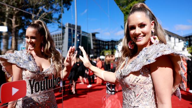 Derry sports a bejewelled gown with huge shoulders and statement earrings. Picture: Getty.