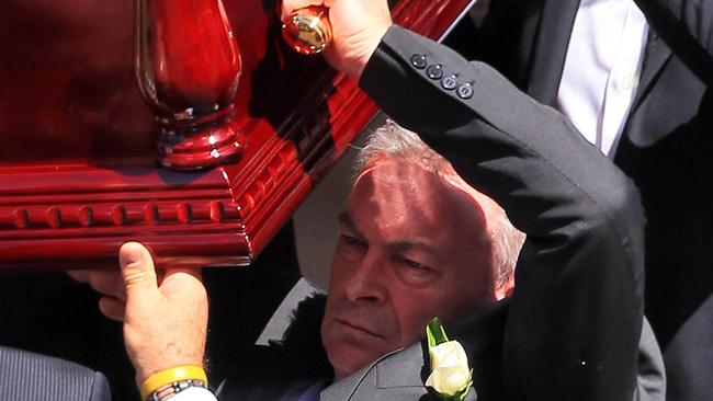 Borce Ristevski carrying his wife’s coffin at her funeral. Picture: Aaron Francis/The Australian