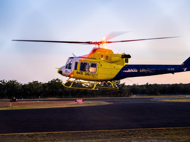 RACQ Lifeflight chopper pictured on the ground at Hervey Bay Airport after assisting with a scuba diver who was attacked by a shark off Indian Head on Fraser Island Picture Cody Fox NRM