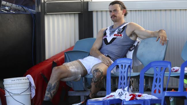 Jasper Pittard finished the match on the bench with ice on his hamstring. Picture: Sarah Reed