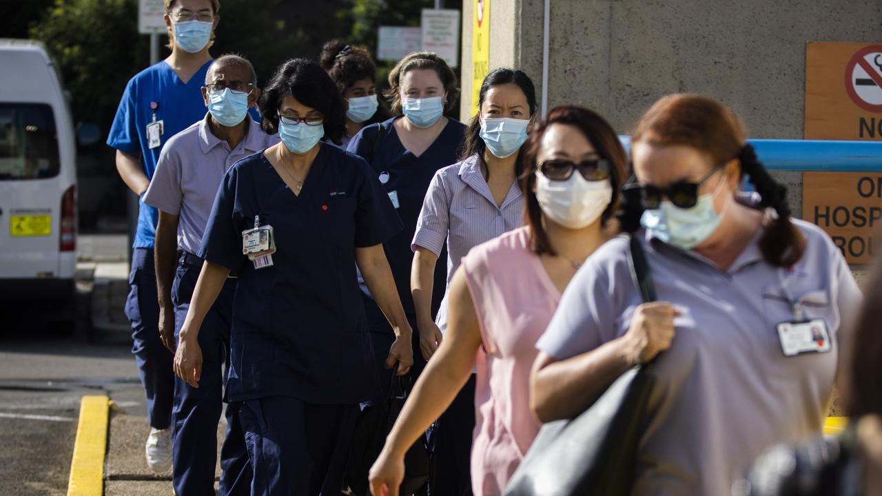 Health care workers arrive at the vaccination hub at Westmead Hospital. Picture: Jenny Evans/Getty Images